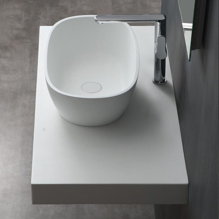 Umyvadlo StoneArt LC149 z minerálního kamene bílé 56×35 lesklé